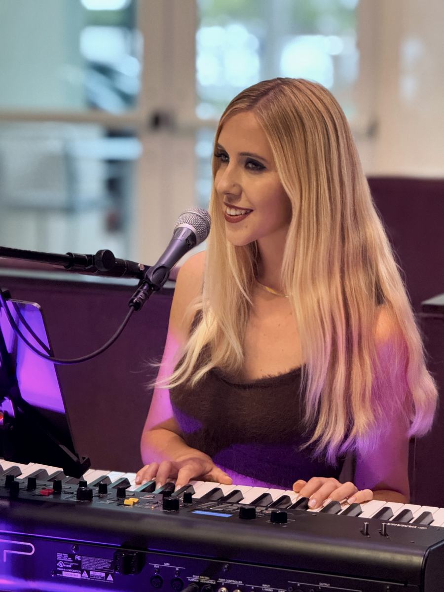 Joanna Holstein singing at a private party
